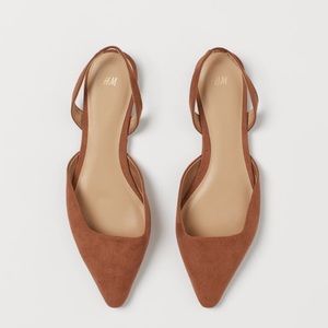 Slingbacks in faux suede with pointed toes.